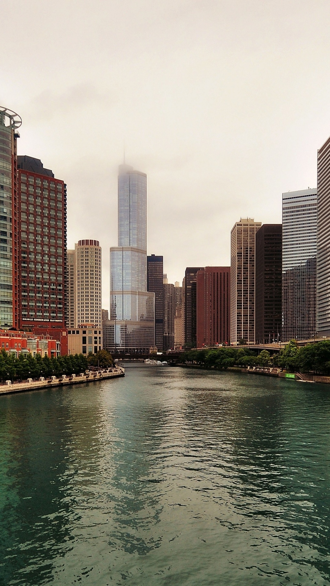 Body of Water Between High Rise Buildings During Daytime. Wallpaper in 1080x1920 Resolution