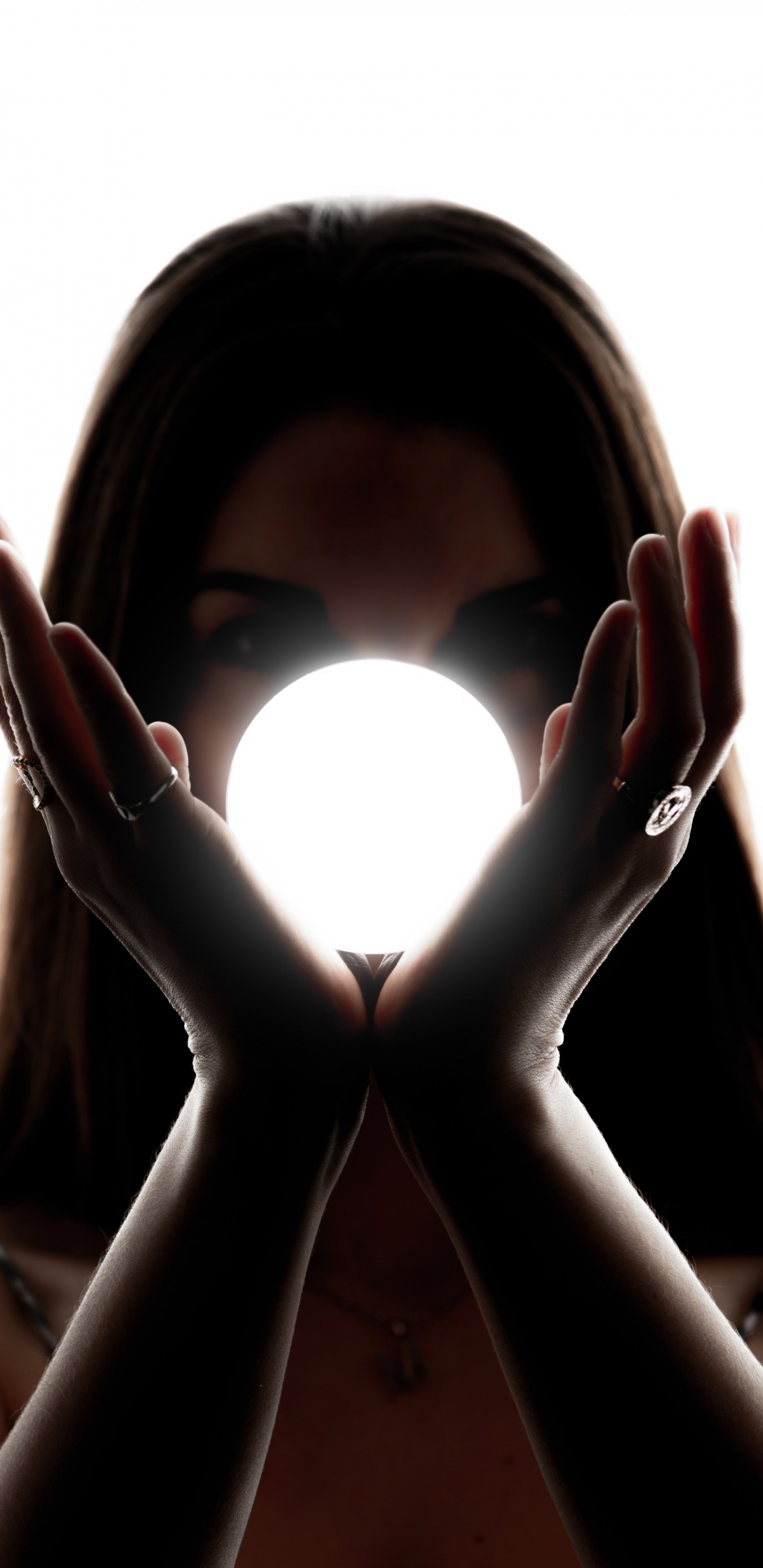 Woman Covering Her Face With Her Hands. Wallpaper in 1440x2960 Resolution