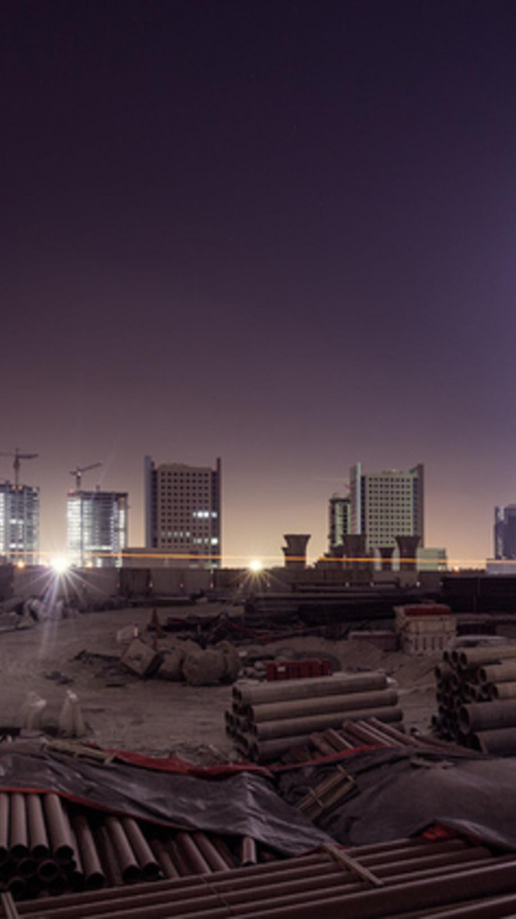 Horizon de la Ville Pendant la Nuit. Wallpaper in 750x1334 Resolution