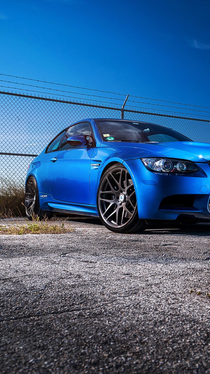 Blue Bmw m 3 Coupe Parked on Brown Field During Daytime. Wallpaper in 720x1280 Resolution