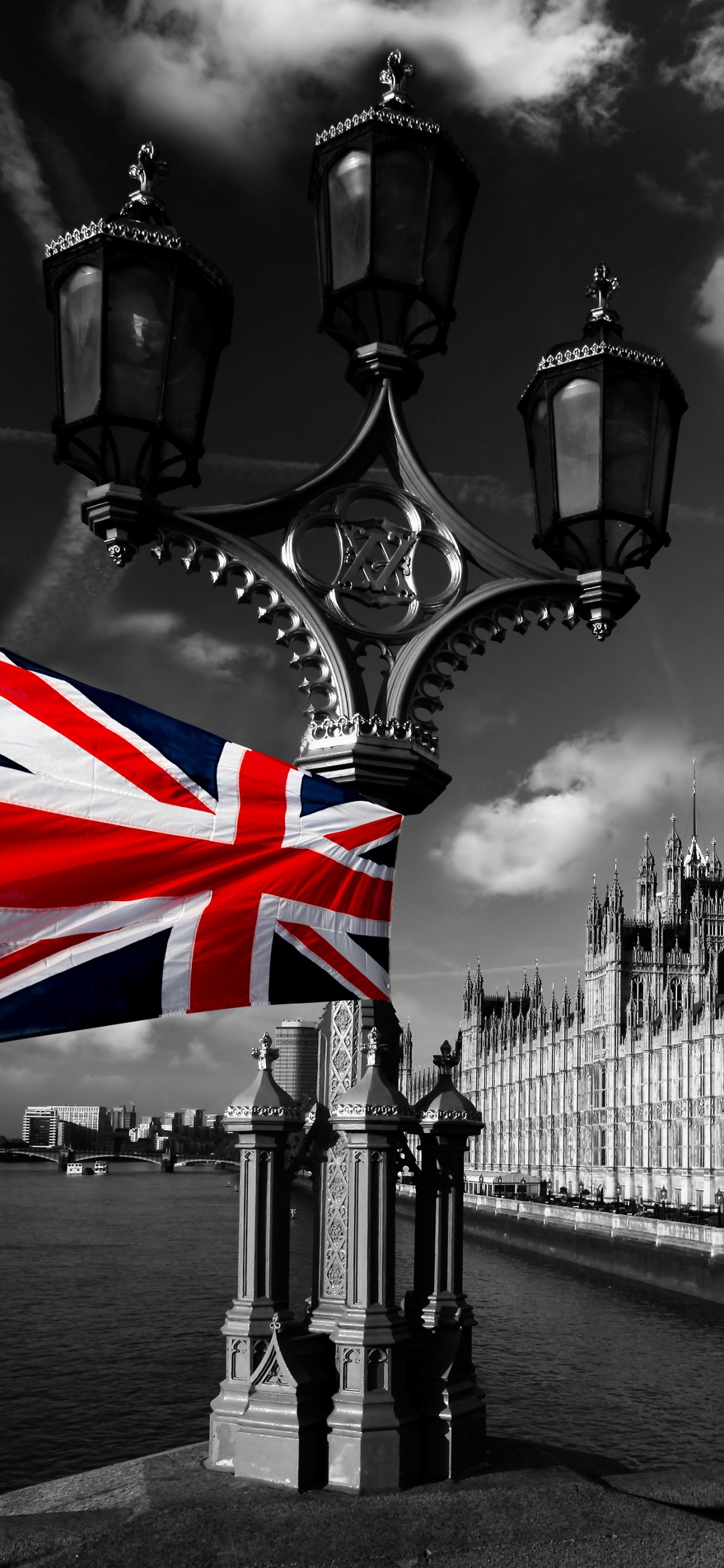 Grayscale Photo of Street Lamp Near Building. Wallpaper in 1242x2688 Resolution