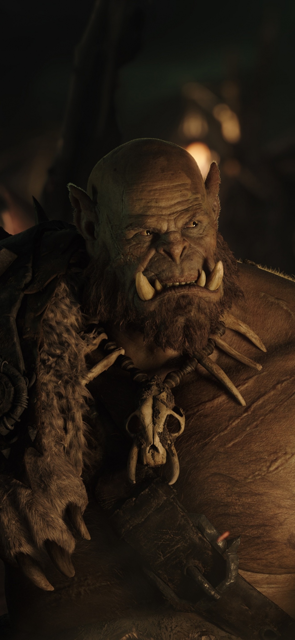 Brown Wooden Elephant Figurine With String Lights. Wallpaper in 1125x2436 Resolution