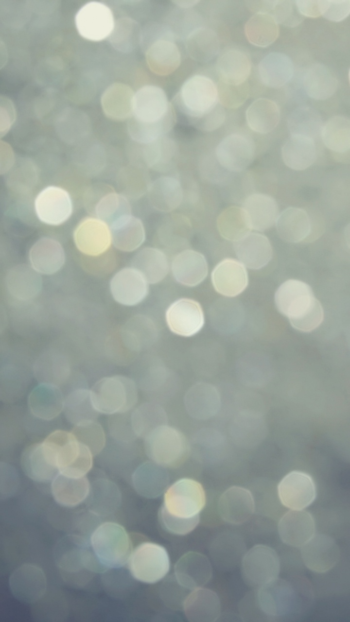 Weiße Und Gelbe Bokeh-Lichter. Wallpaper in 720x1280 Resolution