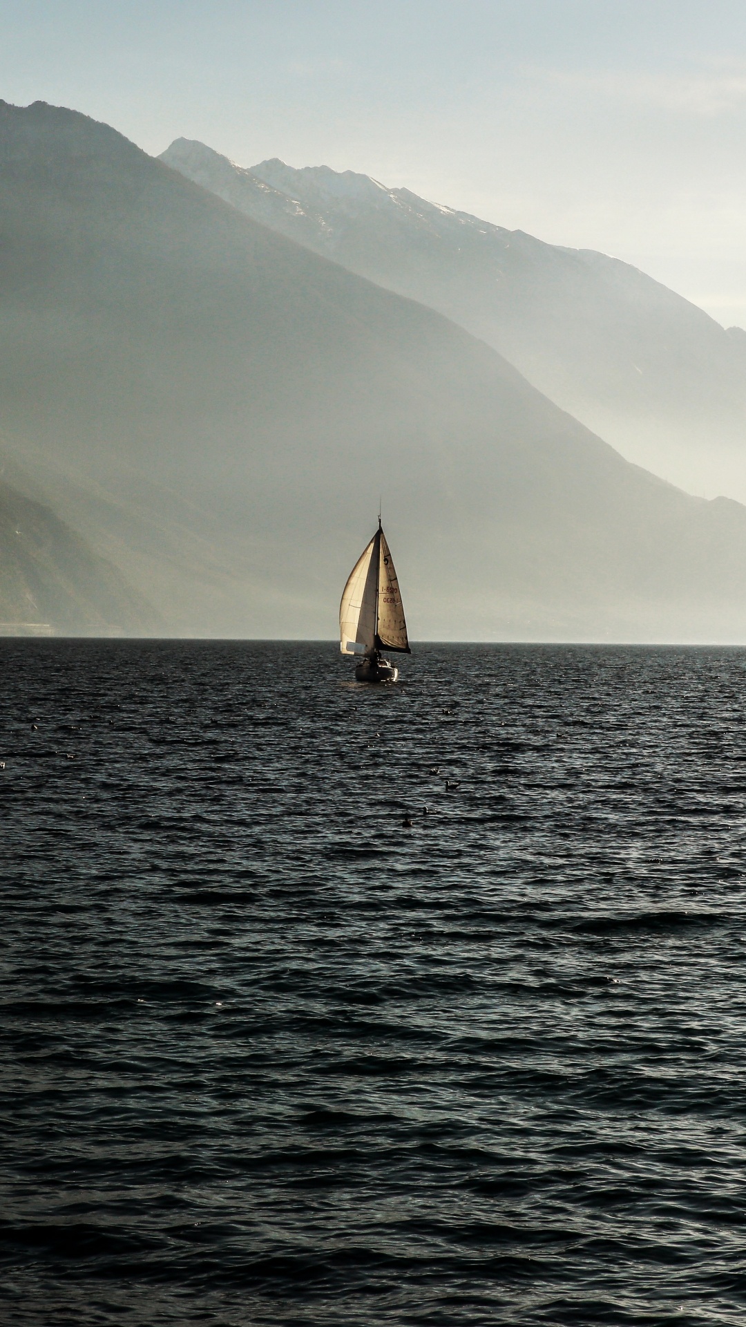 Sailboat on Sea Near Mountain During Daytime. Wallpaper in 1080x1920 Resolution