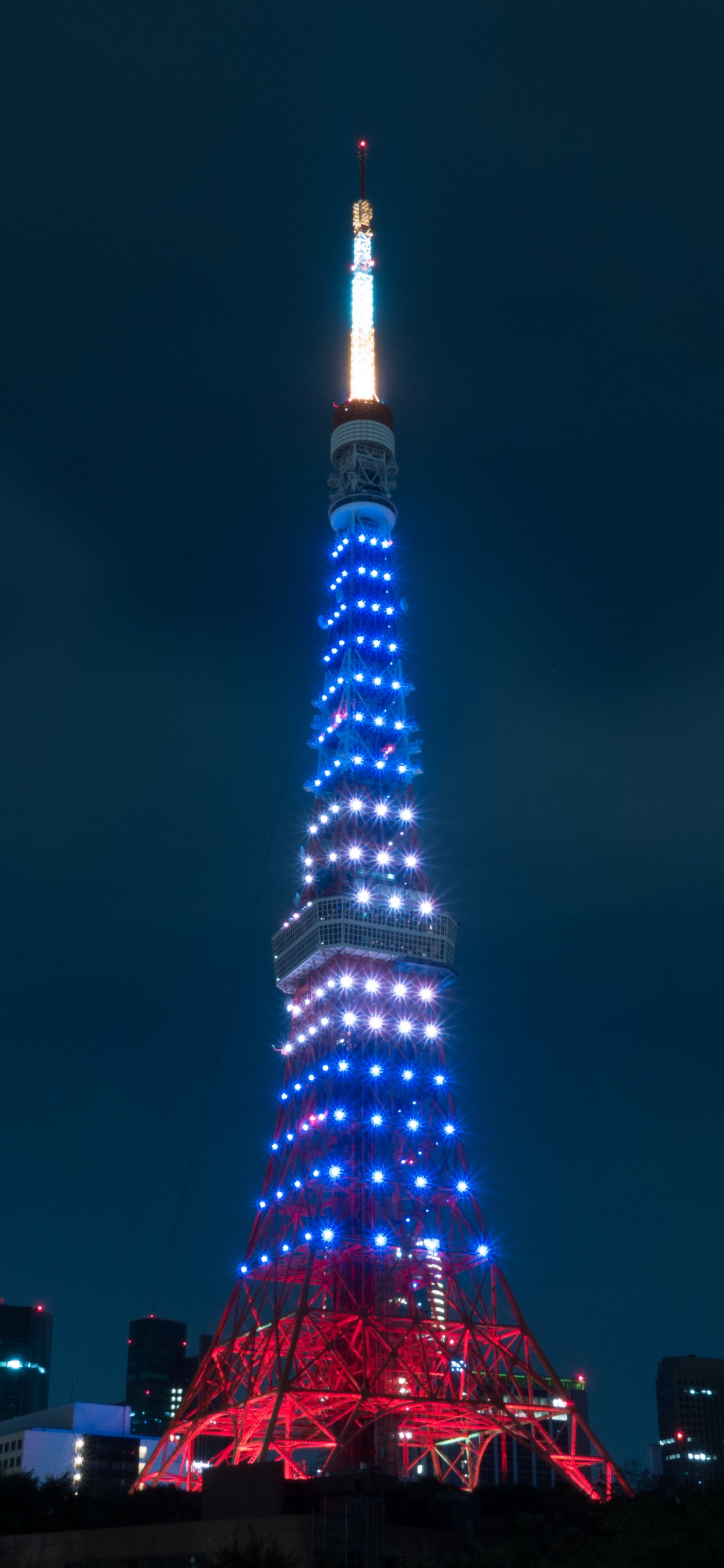 Lighted Eiffel Tower During Night Time. Wallpaper in 1242x2688 Resolution