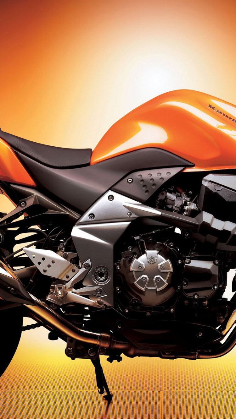 Red and Black Sports Bike. Wallpaper in 750x1334 Resolution