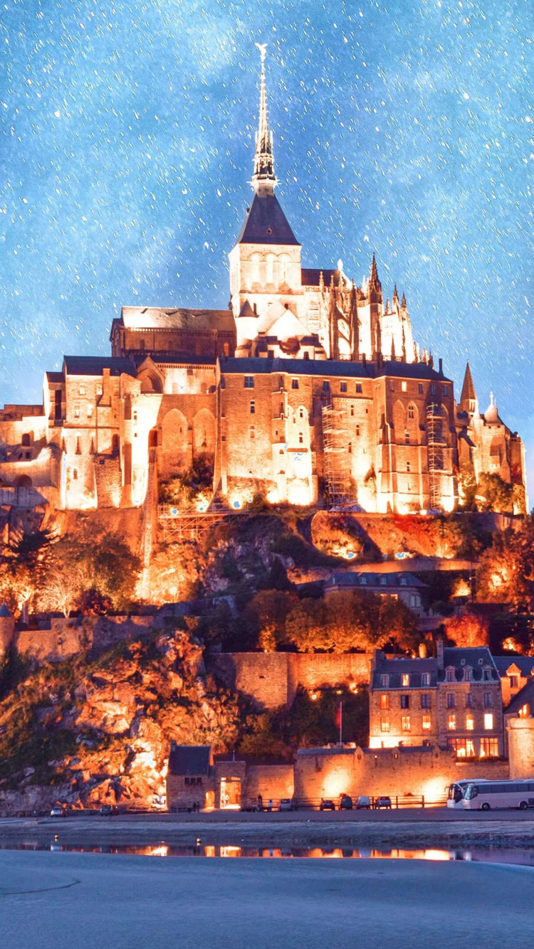 Château Brun Sur Une Formation Rocheuse Brune Près D'un Plan D'eau Pendant la Journée. Wallpaper in 750x1334 Resolution