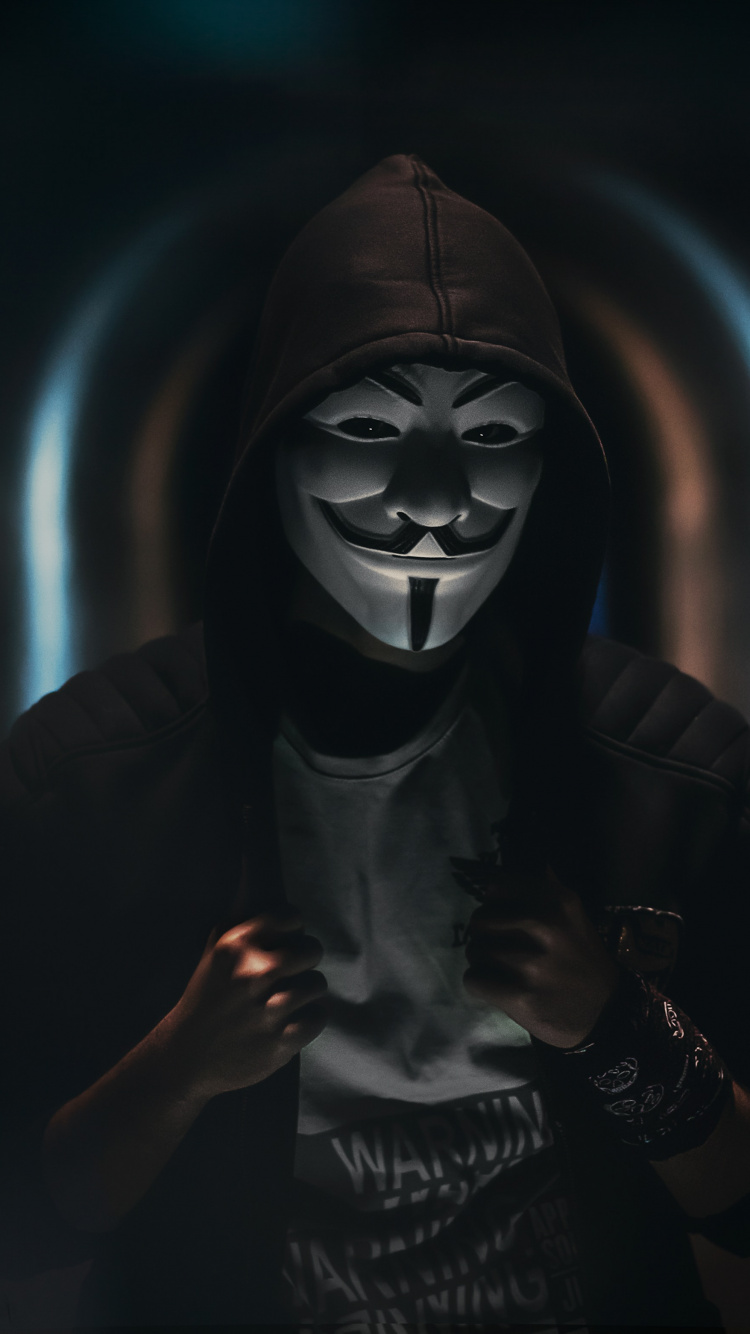 Person Wearing Guy Fawkes Mask. Wallpaper in 750x1334 Resolution