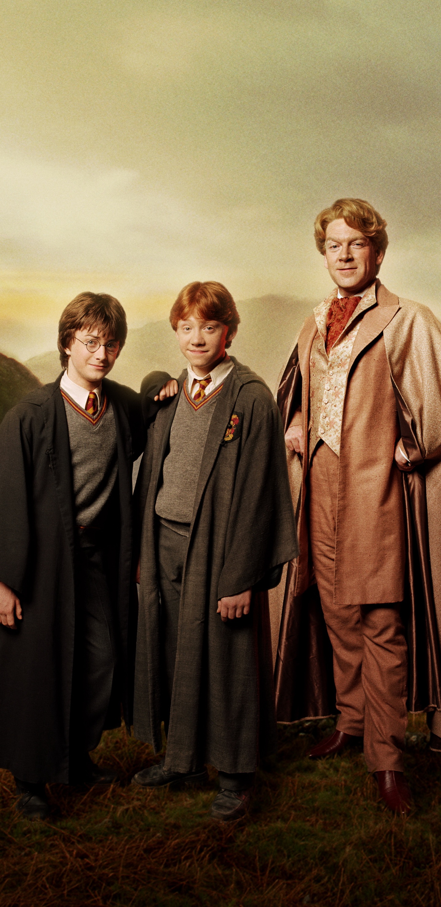 Man in Black Robe Standing Beside Woman in Brown Robe. Wallpaper in 1440x2960 Resolution