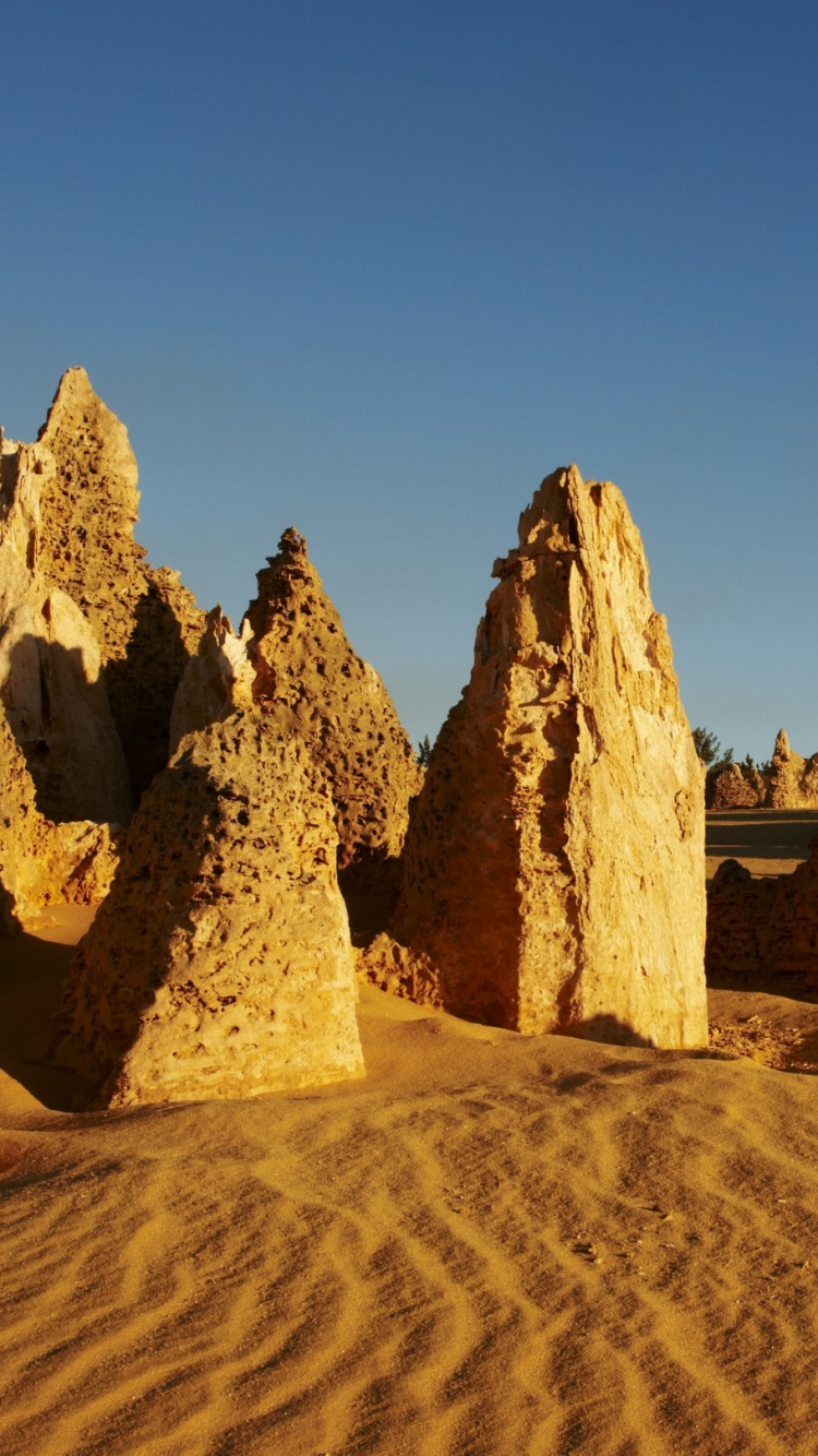 Brown Rock Formation Under Blue Sky During Daytime. Wallpaper in 750x1334 Resolution