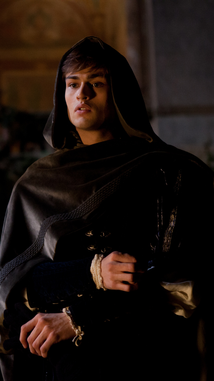 Mujer en Hijab Negro de Pie. Wallpaper in 750x1334 Resolution