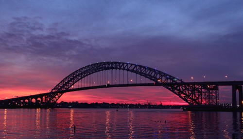 Image black metal bridge under gray clouds