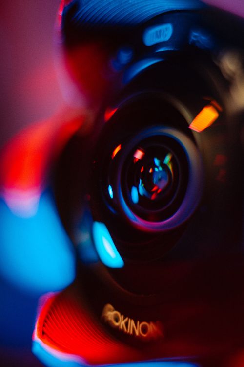 black and orange camera lens