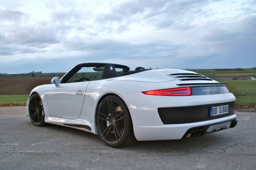 Image white porsche 911 on road under cloudy sky during daytime