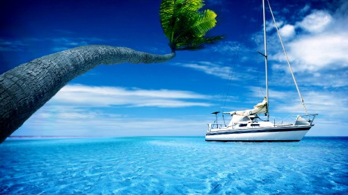 Image white sailboat on blue sea under blue sky during daytime