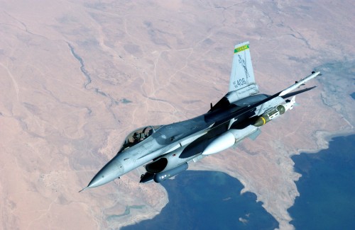 Image gray fighter jet on mid air during daytime