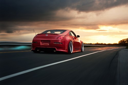 Image red porsche 911 on road during daytime