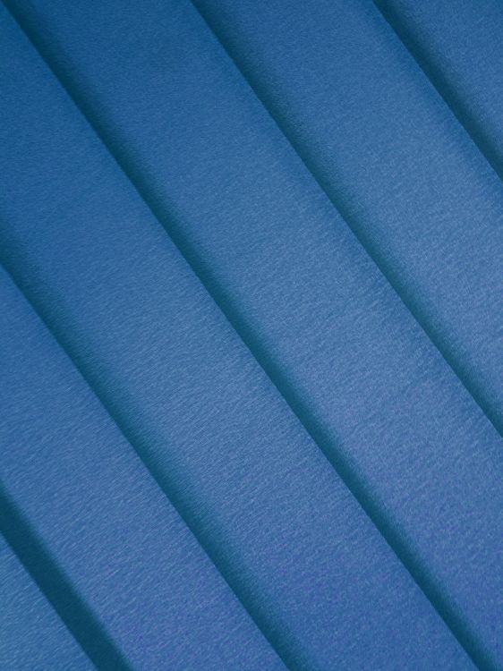 blue textile in close up photography