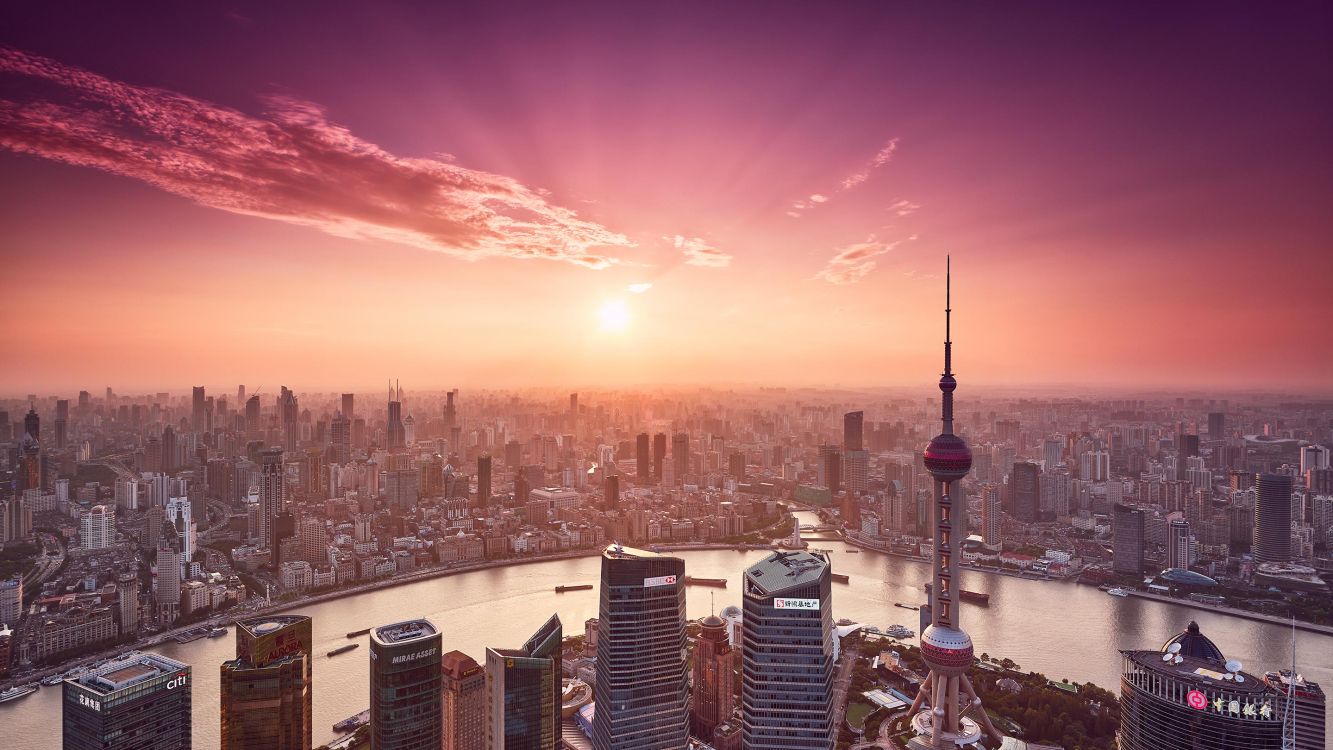 city skyline during sunset with city buildings