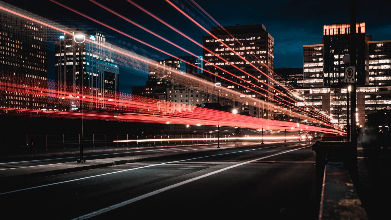 time lapse photography of city lights during night time