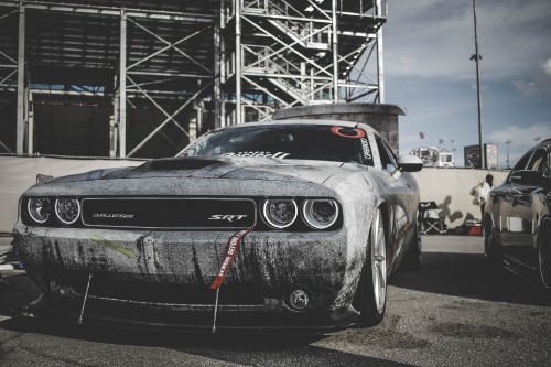 Image gray and black sports car on road during daytime