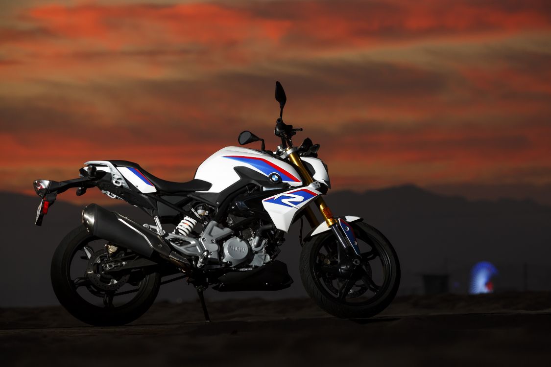 white and black sports bike