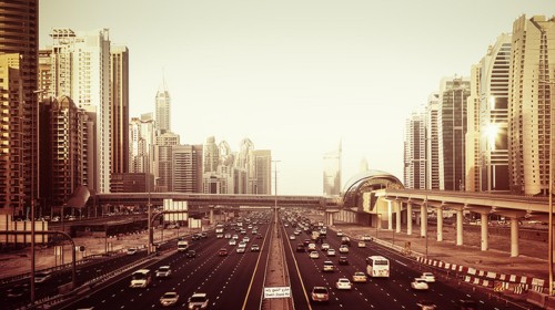 Image cars on road in city during daytime