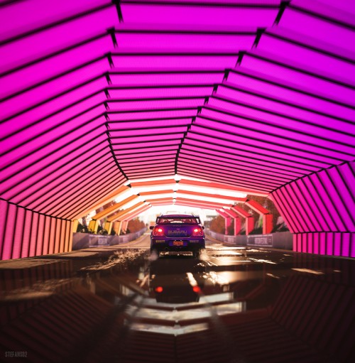 Image red and black car in tunnel