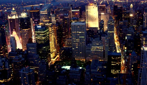 Image aerial view of city buildings during night time