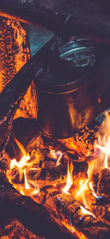 Image burning wood on fire pit