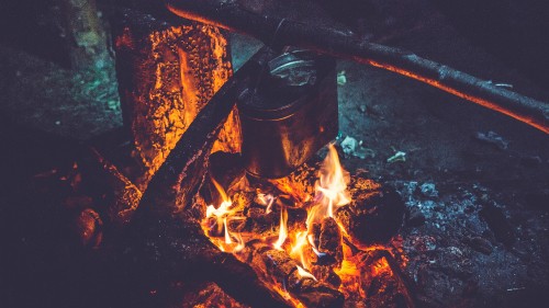 Image burning wood on fire pit