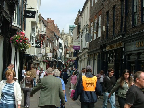 Image people walking on street during daytime