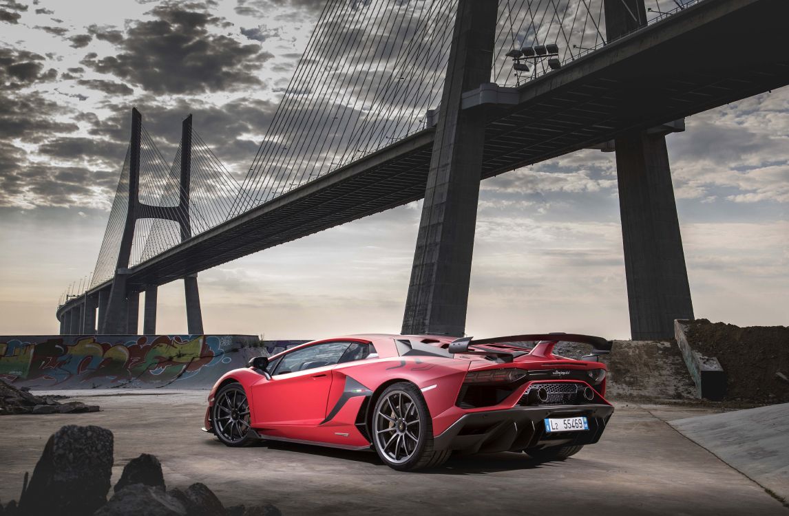 Roter Ferrari 458 Italia in Der Nähe Der Brücke Geparkt. Wallpaper in 6590x4311 Resolution