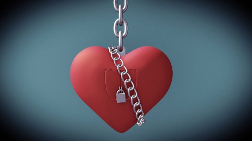Image red heart with silver padlock