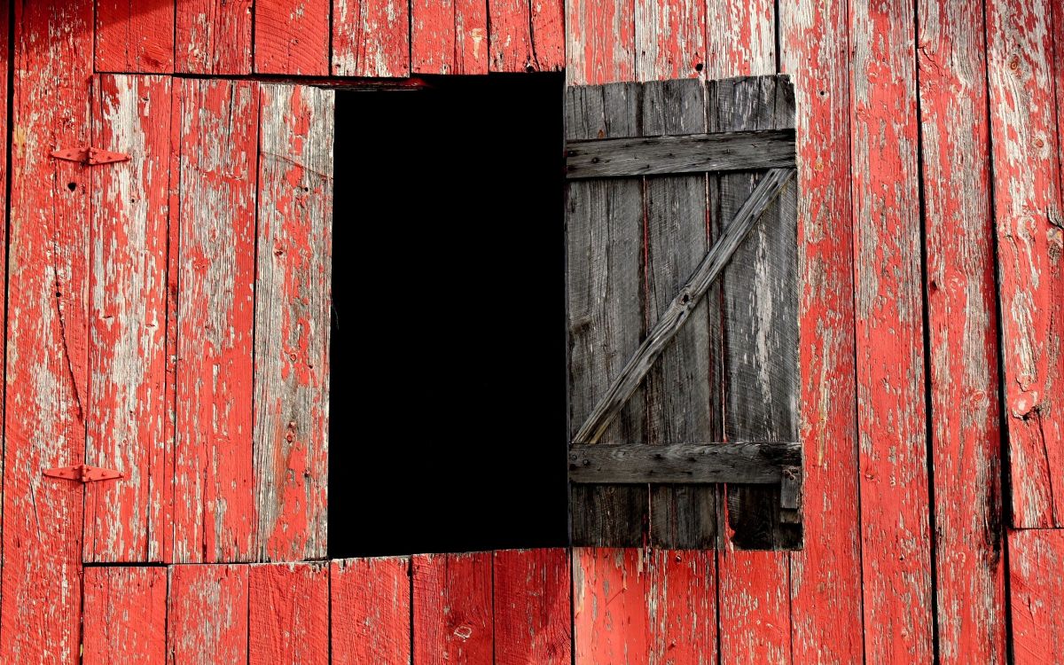 red wooden door with brown wooden door