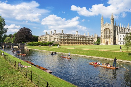 Image people riding on boat on river near building during daytime