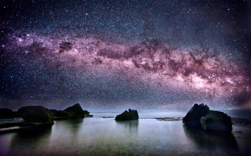 Image body of water under starry night