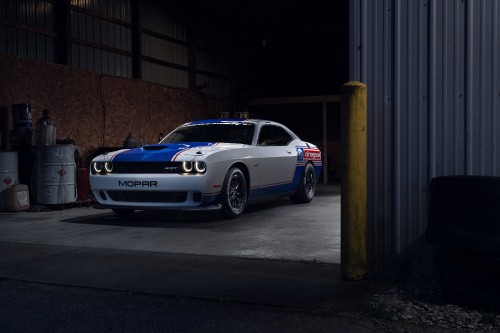 Image blue and white bmw m 3 coupe parked on sidewalk during daytime