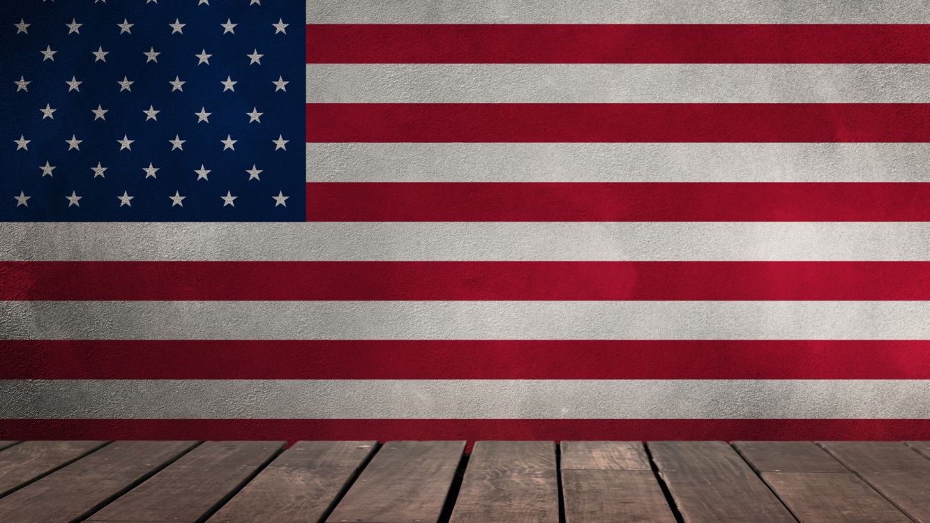 us a flag on brown wooden floor