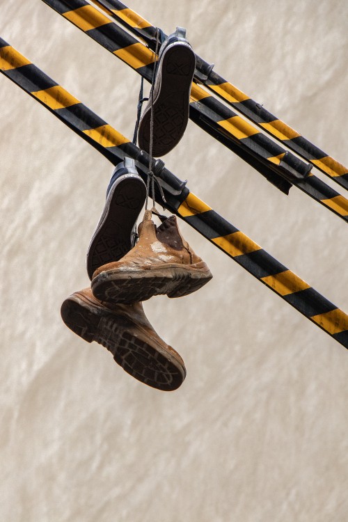 Image brown and black high top sneakers