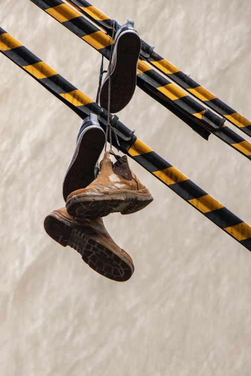 brown and black high top sneakers