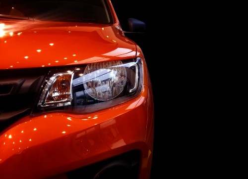 Image orange car with white lights