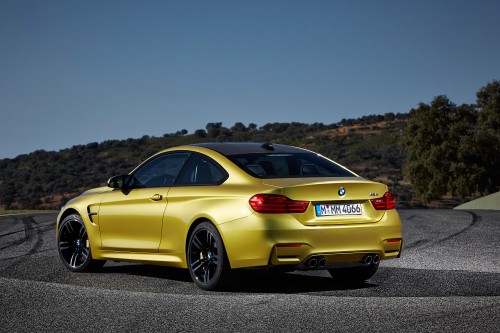 Image yellow bmw m 3 on road during daytime