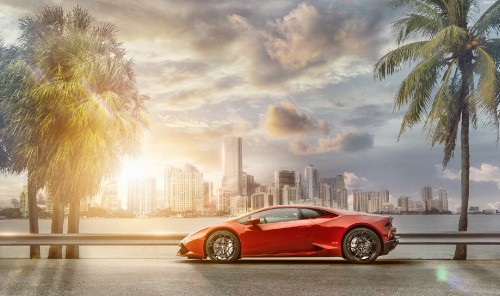 Image red porsche 911 on beach during sunset