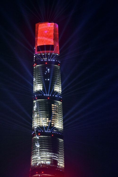 red and black tower during night time