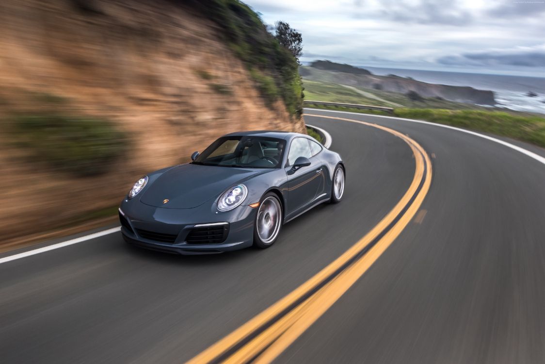 black porsche 911 on road during daytime