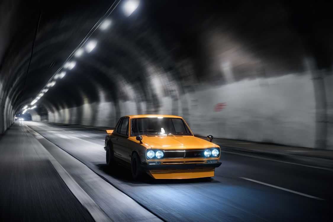 yellow chevrolet camaro on road