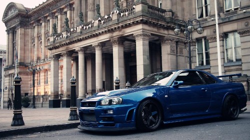 Image blue bmw m 3 coupe parked near building during daytime