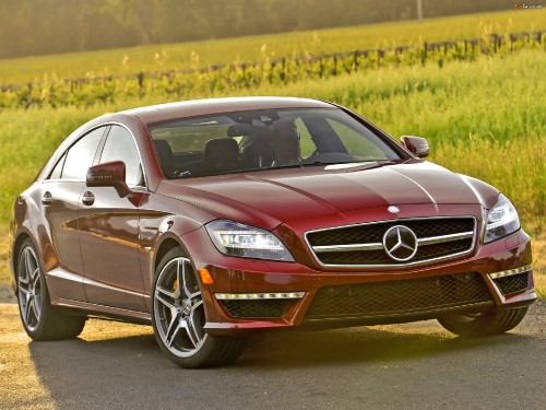 Image red mercedes benz coupe on road during daytime