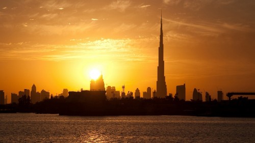 Image silhouette of city buildings during sunset